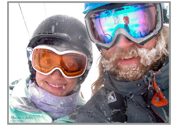 Olympus Stylus 1050 SW arm's-length ski lift self-portrait