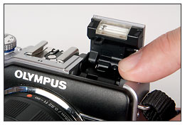 Olympus E-PL1 flash in bounce position