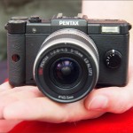 Pentax Q camera - in hand to show size