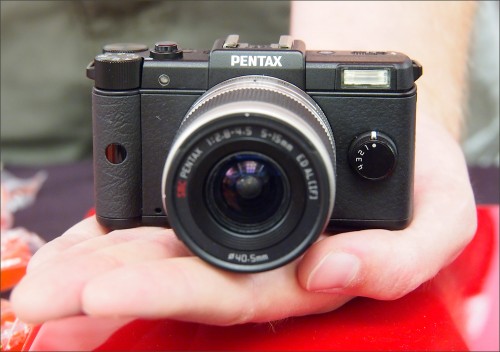 Pentax Q camera - in hand to show size