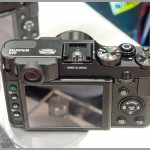 Top controls and rear LCD on the Fujifilm X10 camera