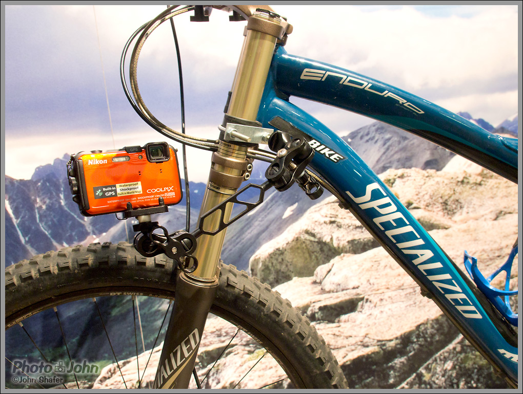 Nikon Coolpix AW100 camera mounted on a mountain bike