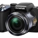 Olympus Stylus SP-820UZ iHS Superzoom Camera - Left - Front Right