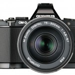 New Olympus 75-300mm f/4.8-6.7 II Zoom Lens On Black OM-D E-M5 - Front