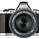 New Olympus 75-300mm f/4.8-6.7 II Zoom Lens On Silver OM-D E-M5 - Front